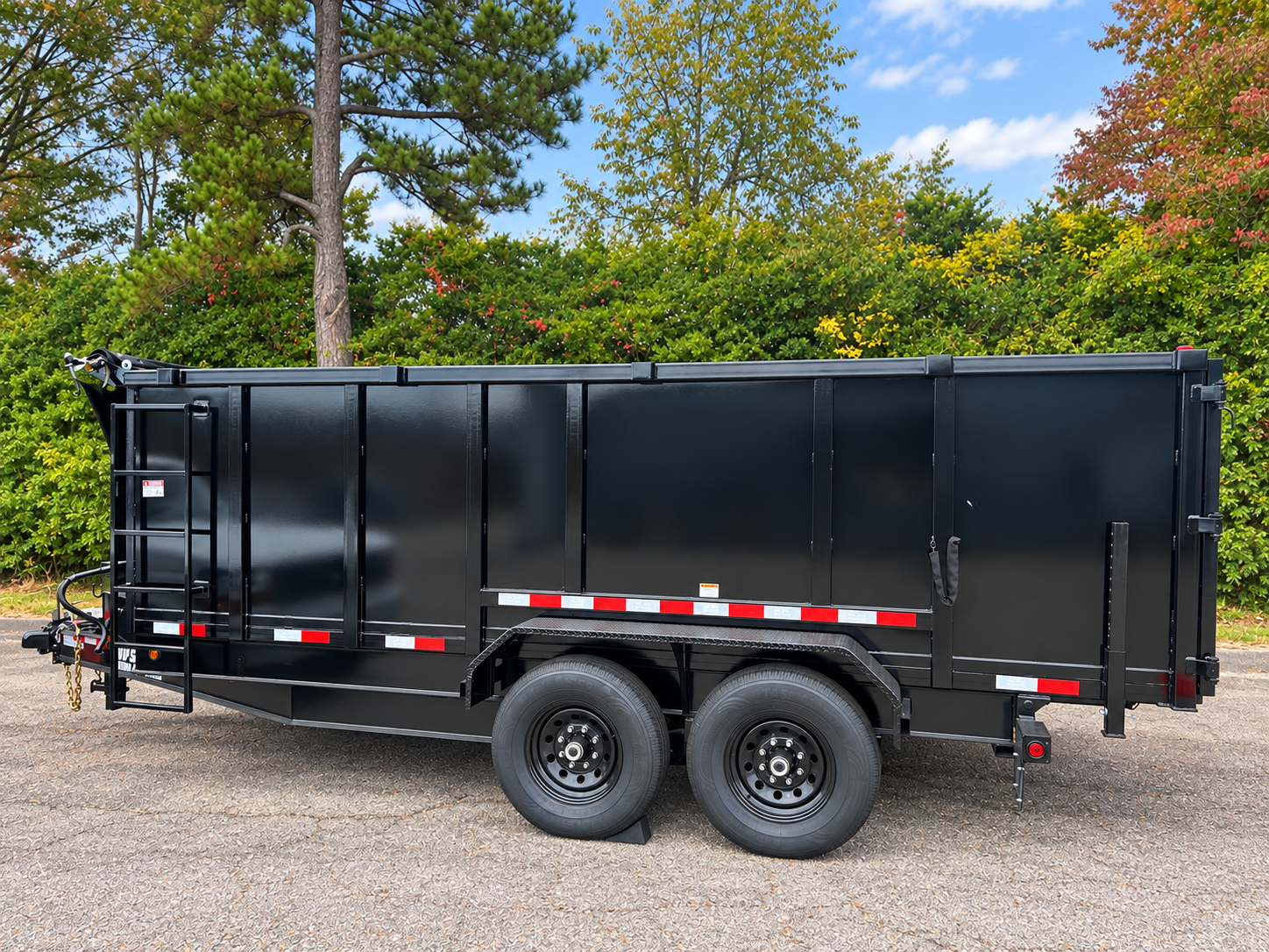 Side view of Archer Transport Co.'s black dump trailer